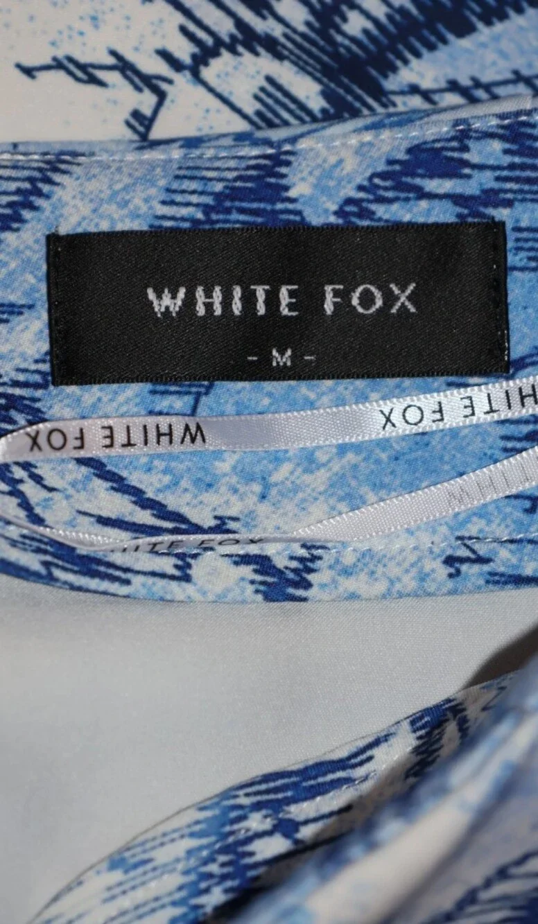 White Fox Boutique Slow Down  Blue Angel Mini Skirt.